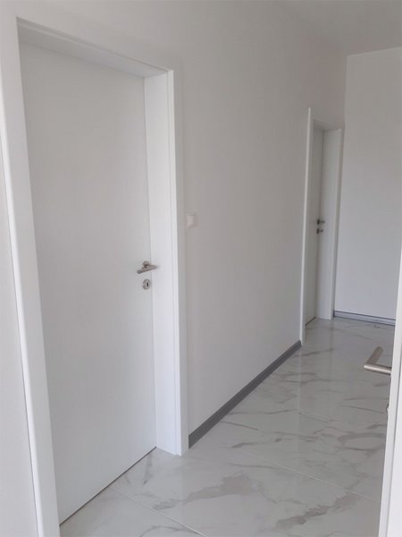 Laminátové dvere – Biela Premium W1000 ST22